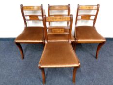 A set of four Reprodux Regency style dining chairs