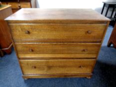 A 20th century Vesper Furniture oak dressing table with triple mirror, width 107 cm,