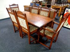 An Old Charm refectory dining table (as found) together with a set of six Old Charm chairs,