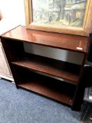 A low set of mahogany shelves, width 80 cm,