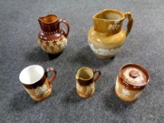 Five items of stoneware to include examples by Doulton Lambeth etc