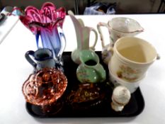 A tray containing art glass vase, ceramic jug,