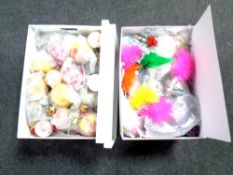 Two boxes containing a quantity of Christmas decorations and baubles