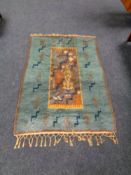 A fringed woolen mid century wall hanging,