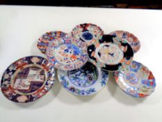 Eleven antique imari plates