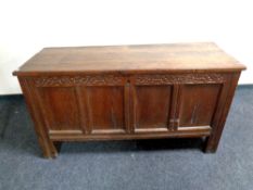 An early 19th century oak blanket box,