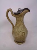 A Victorian water jug with pewter lid