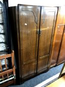 A 1930s oak wardrobe,