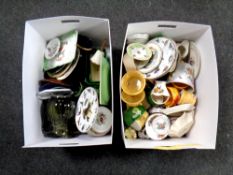 Two boxes containing decorative plates, china dishes,
