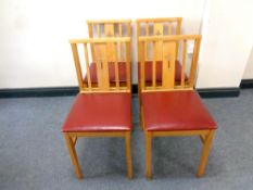 Four beech chapel chairs,