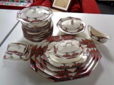 A quantity of Crown Ducal dinnerware to include graduated plates, dinner plates,