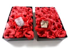 Two boxes containing a quantity of tea lights in glass dishes