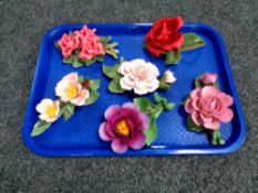 A collection of Italian Capodimonte porcelain flowers