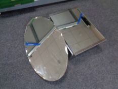 A 20th century frameless bathroom mirror together with a mirrored bathroom cabinet