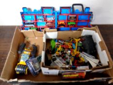 A box containing mid 20th century and later play worn die cast vehicles,