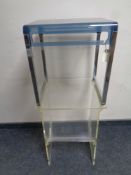 A clear perspex magazine table together with a further perspex occasional table on metal legs