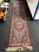 A machined Persian design runner,