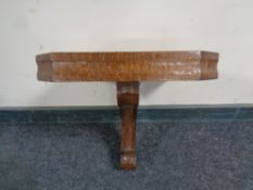 An Edwardian oak clock bracket