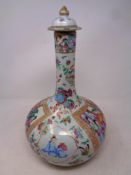 A 19th century Canton famille rose bulbous lidded vase,