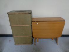 A teak melamine drop leaf table together with a bentwood bound trunk