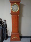A continental painted longcase clock with circular dial