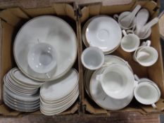 Two boxes containing assorted white and gilt tea and dinnerware