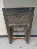 An antique cast iron fire insert