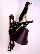A cast iron Border Collie wall bracket with bell