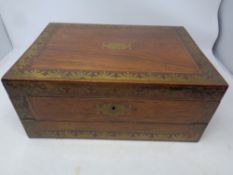 A Victorian walnut brass inlaid fitted writing box