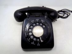 A black Bakelite cased telephone