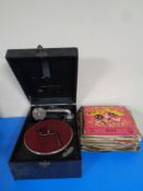 An early 20th century Colombia portable gramophone together with a quantity of 78s