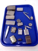 A box containing assorted metal wares to include vesta cases, pill boxes, pocket lighters,