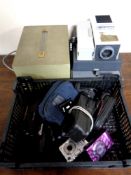 A crate containing assorted cameras together with a Rank Hylite projector in case