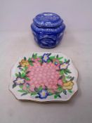 A Maling North East Coast Exhibition Bridges tea caddy together with a Maling floral patterned