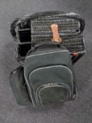 A wicker picnic basket together with a Hi Gear picnic backpack