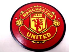 A cast iron Manchester United plaque