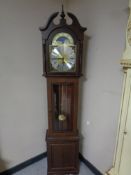 A contemporary longcase clock with moon phase dial