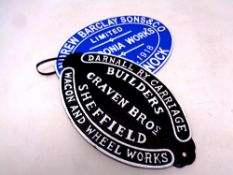 Two cast iron plaques,