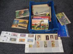 A crate containing cigarette and tea card albums to include Senior Service,