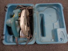 A Makita 190 mm circular hand saw in case,