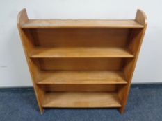 A set of mid 20th century open bookshelves