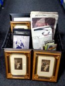 A crate containing Royal Family newspapers and books, framed Art Deco prints,
