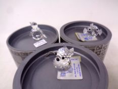 Three Swarovski crystal ornaments, cat,