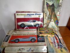A box containing 20th century plastic modelling kits to include Airfix Spitfire hovercraft and Beam