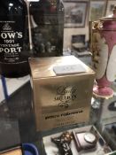 A bottle of Paco Rabanne Lady Million perfume,