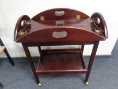 A butler's tray on two tier trolley