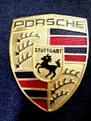 An aluminium Porsche shield plaque