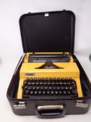 A vintage Erika typewriter in leather case