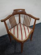 An Edwardian inlaid mahogany corner chair