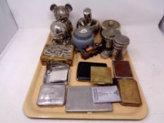 A tray containing assorted metal wares to include ashtrays, cigarette cases, cigarette box,